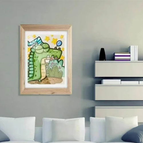 cadre dessin enfant accroché à un mur