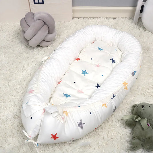 réducteur de lit respirant sur un tapis blanc