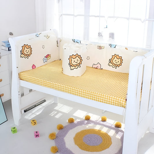 tour de lit bébé avec des petits lions