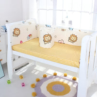 tour de lit bébé avec des petits lions