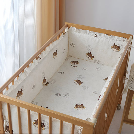 tour de lit blanc avec des oursons