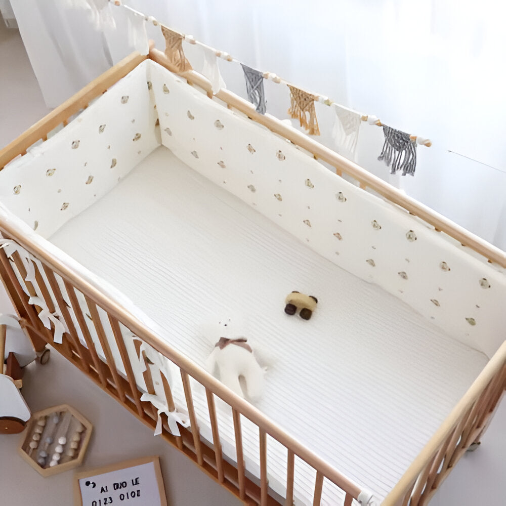 tour de lit bébé dans un lit pour bébé