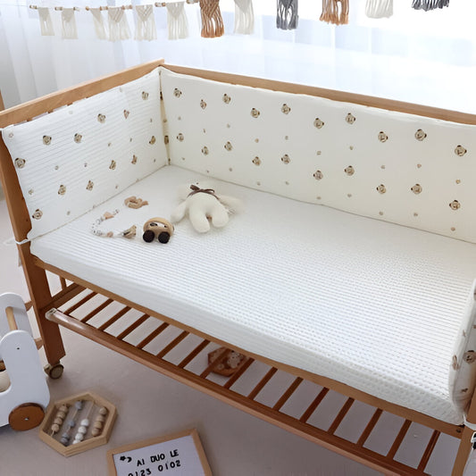 tour de lit cabane dans un lit à barreaux