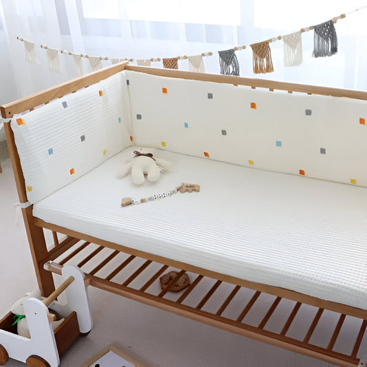 tours de lit bebe colorés