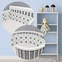 tour de lit bébé complet dans une chambre de bébé